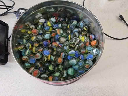 Photo of free Tin of marbles (Putnoe MK41) #1
