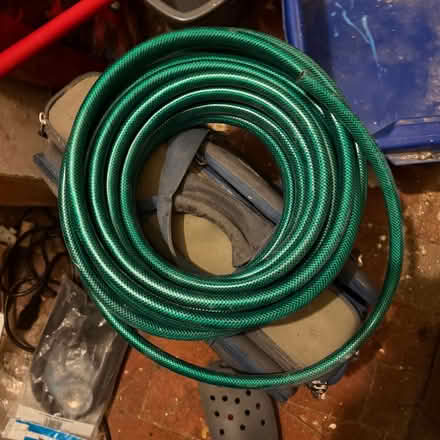 Photo of free Roll of unused green garden hose (Coley Ave Area RG1) #1