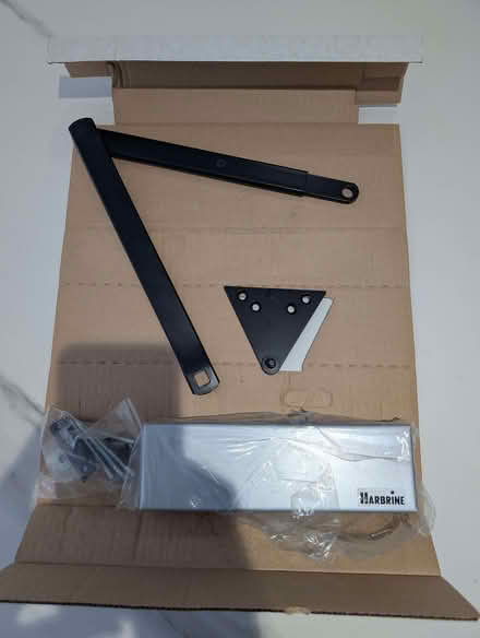 Photo of free 4 Overhead door closers with a black linkage arms (Wokingham RG40) #2