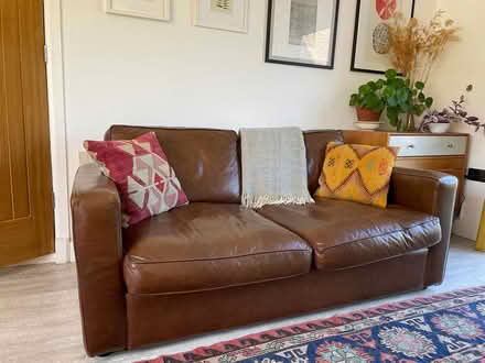 Photo of free Two-seater leather sofa (GU5, Gomshall) #1