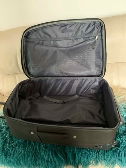 Photo of free Black medium sized suitcase (Leasowe CH45) #2