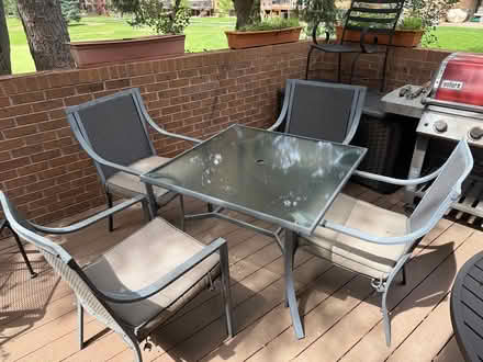 Photo of free Glass patio table and chairs (Parker & Hampden area) #1