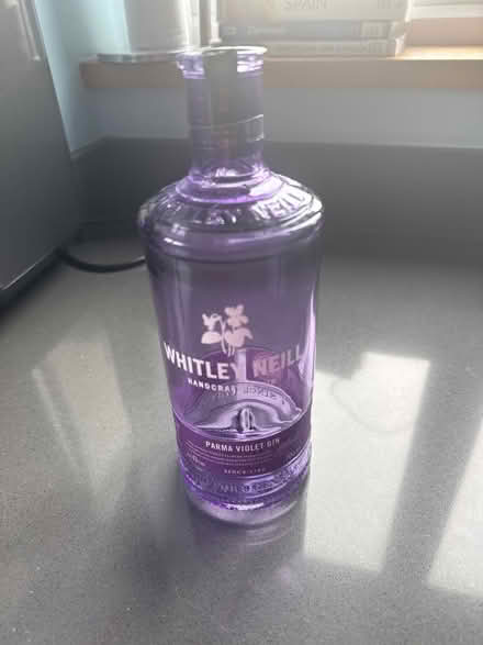 Photo of free Purple glass bottle (Norton Lees S8) #1