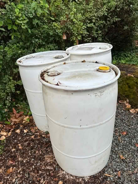 Photo of free Four free 50 gal water barrels (108 N. 34th) #2