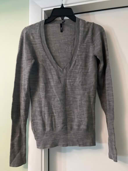 Photo of free Women’s Takeout sweater Medium (S Section) #1