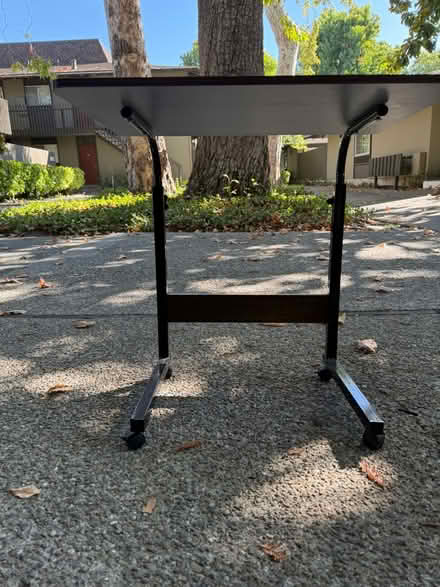 Photo of free Small adjustable desk on casters (1075 Valencia Avenue) #2