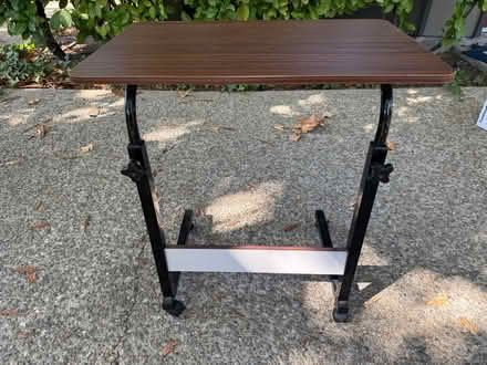 Photo of free Small adjustable desk on casters (1075 Valencia Avenue) #1