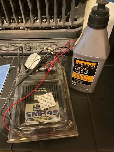 Photo of free Motorbike battery charger and engine oil (Pollards Hill SW16) #1