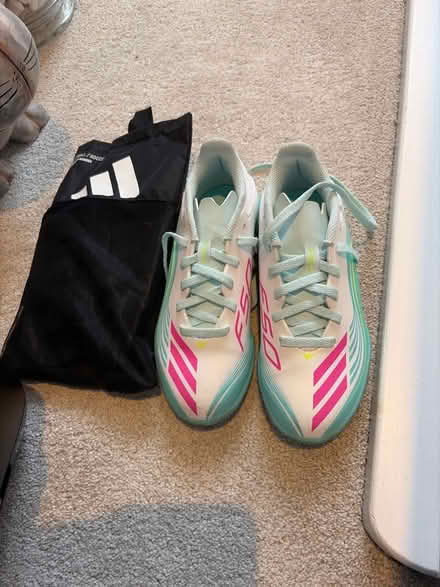 Photo of free Astroturfs size 13.5 and shin pads (Goodnestone ME13) #1