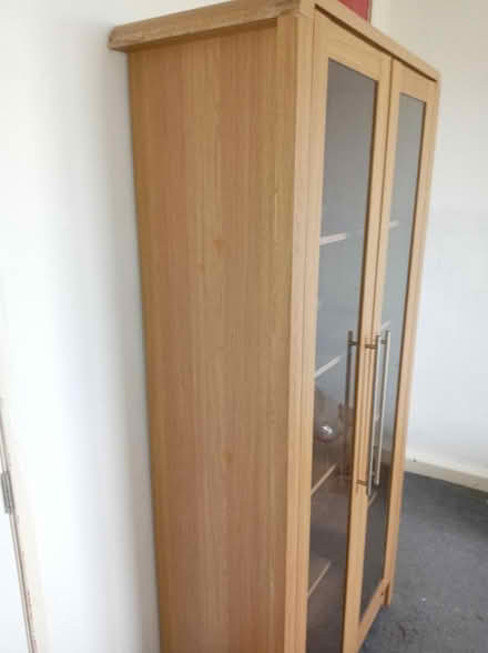 Photo of free Tall glass cabinet with light (Holmewood BD4) #4