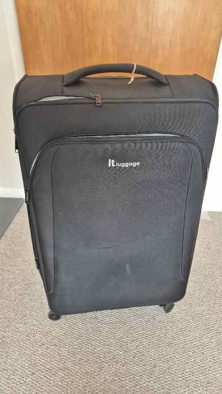 Photo of free Large black it luggage suitcase (Figge's Marsh CR4) #1