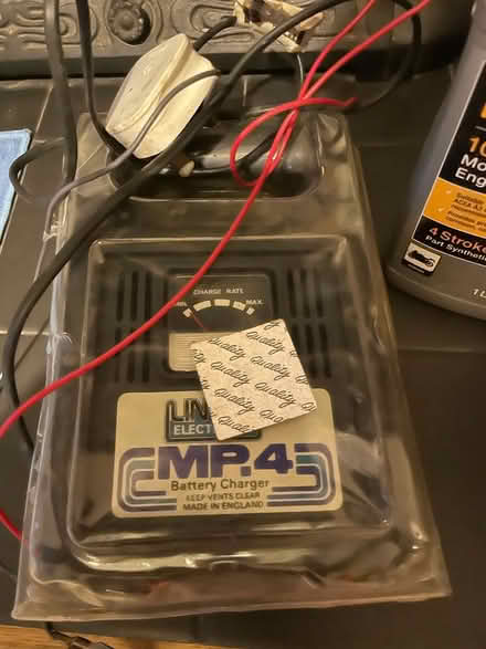 Photo of free Motorbike battery charger and engine oil (Pollards Hill SW16) #2
