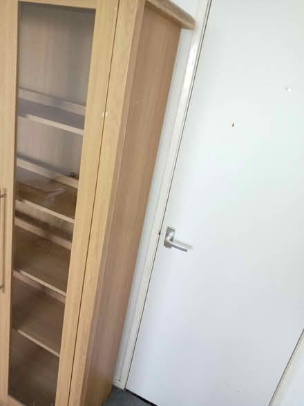 Photo of free Tall glass cabinet with light (Holmewood BD4) #2