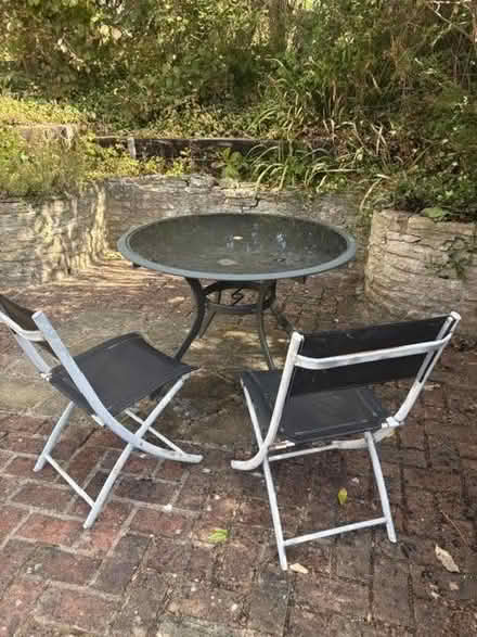 Photo of free Outdoor glass table and 2 folding chairs (Kennington OX1) #1