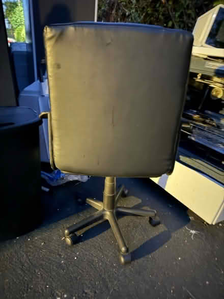 Photo of free Black vinyl office chair (1075 Valencia Avenue) #2