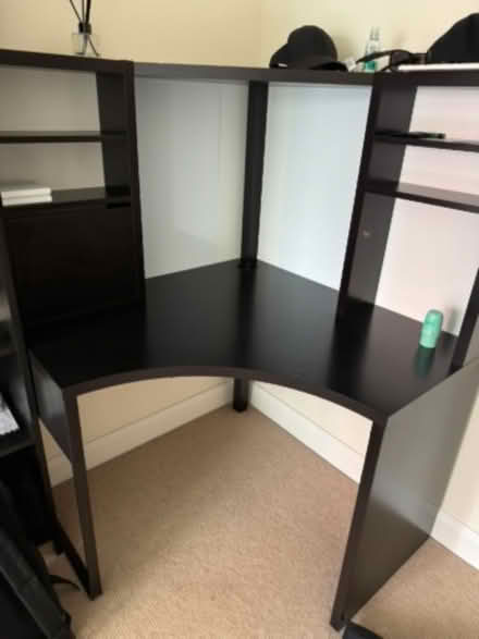 Photo of free Large black L-shaped corner desk with built-in shelving. (South Bermondsey SE16) #1