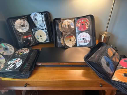 Photo of free Philips DVD player and 4 big files of DVDs and CDs (Woodford SK7) #1