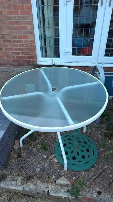 Photo of free White round glass garden table, bits of rust (Stopsley LU2) #1