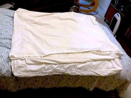 Photo of free Mattress outer cover (Eaton NR4) #1