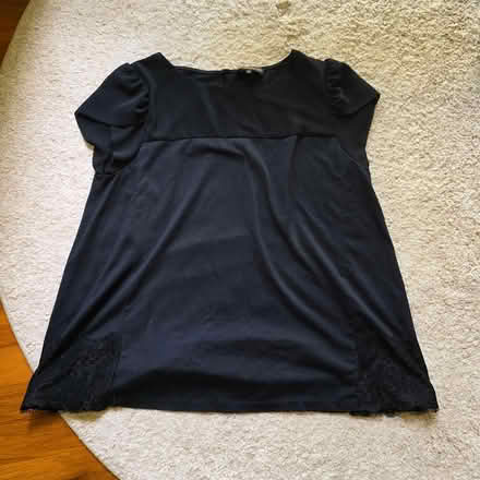 Photo of free Women's black top size XS (New Milford, NJ) #1