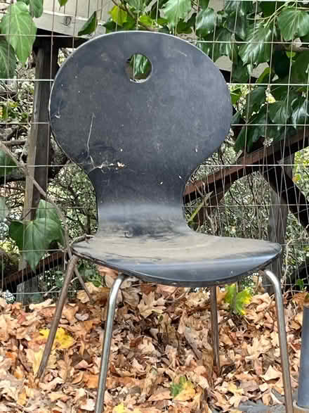 Photo of free Cheap bent composite wood chair (133 Martens Blvd, San Rafael) #1