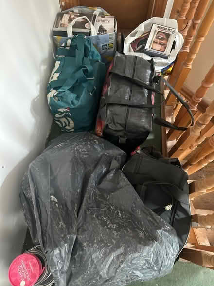 Photo of free 6 bags of DVDs (North Wall) #1