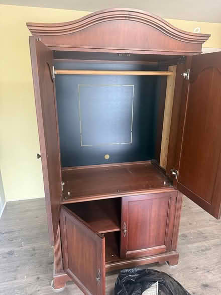 Photo of free Large Solid Wood TV Armoire (1810 main street) #1