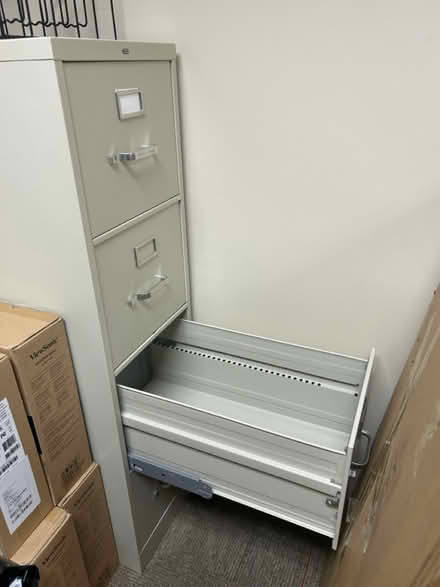 Photo of free Tan metal filing cabinet (Navy Yard, SE DC) #1