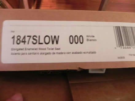 Photo of free White wood toilet seat (long) (Ridgewood, 11385 near FPR) #2