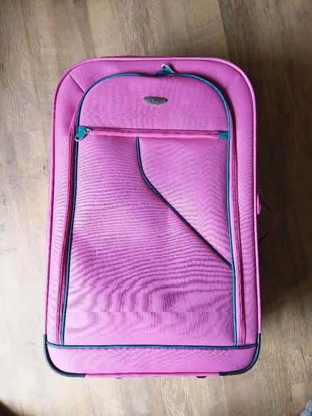 Photo of free Large suitcase (Motherby CA11) #1