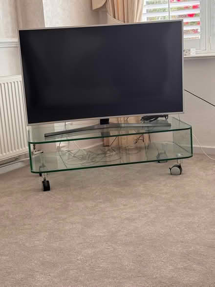 Photo of free Glass tv table on castors (Formby) #1