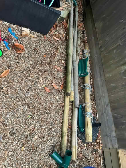 Photo of free Wooden table, metal legs, wooden poles from swing (Chorleywood WD3) #1