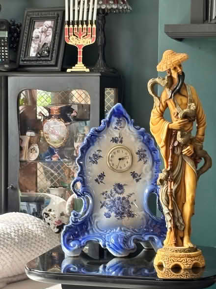 Photo of free Clock and man ornamental (Al100DJ) #1