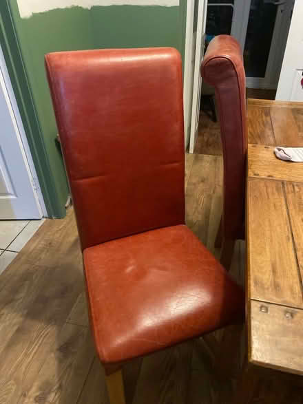 Photo of free 4 x red leather oak dining chairs (Guisborough TS14) #1