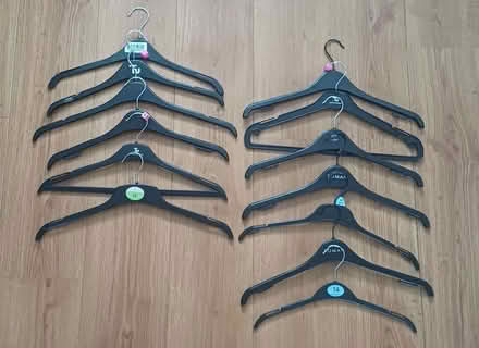 Photo of free 13 plastic clothes hangers (Johnstone PA5) #1