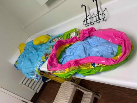 Photo of free Inflatable baby pools, wall rack (1075 Valencia Avenue) #1