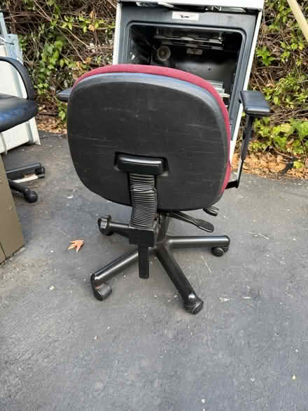 Photo of free Red upholstered fabric office chair (1075 Valencia Avenue) #3