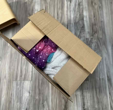 Photo of free Box of adult size onesies (SE5) #2