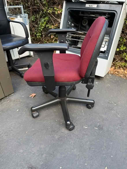 Photo of free Red upholstered fabric office chair (1075 Valencia Avenue) #2