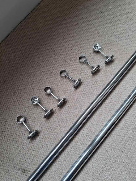 Photo of free 2 chrome wardrobe rails (SL8 5RU) #1