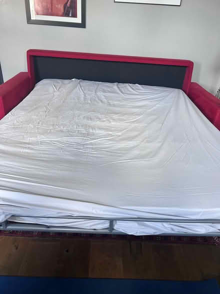 Photo of free Red sofa bed - double. With topper (East Finchley N2) #2