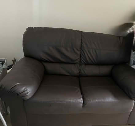 Photo of free Dark brown faux leather sofa (Eggington LU7) #1
