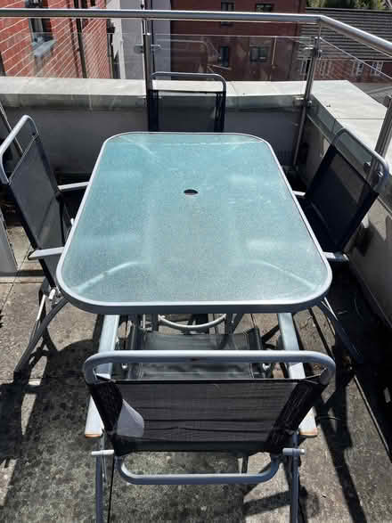 Photo of free Glass garden table and 4 chairs (Spencer Place RG21) #1