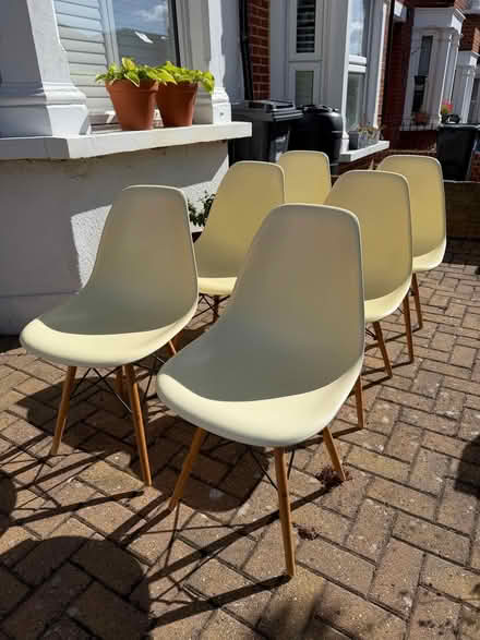 Photo of free Six Eames-style cream-colour chairs (Woodford Green) #4