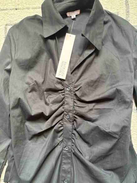 Photo of free NEW Black Women’s Shirt (Rego Park) #2