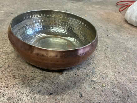 Photo of free Copper coloured hammer effect shallow metal bowl 25 cm wide (Great Boughton CH3) #1