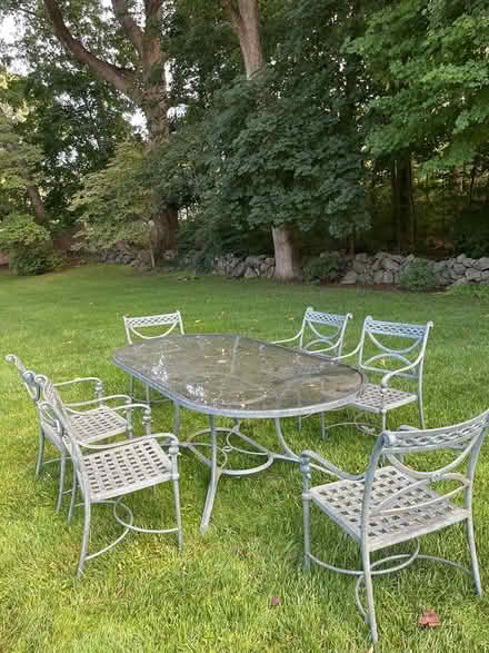 Photo of free Glass top patio table with 6 chairs (New Canaan ct) #1