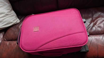 Photo of free Small pink suitcase on wheels (Dronfield S18) #1