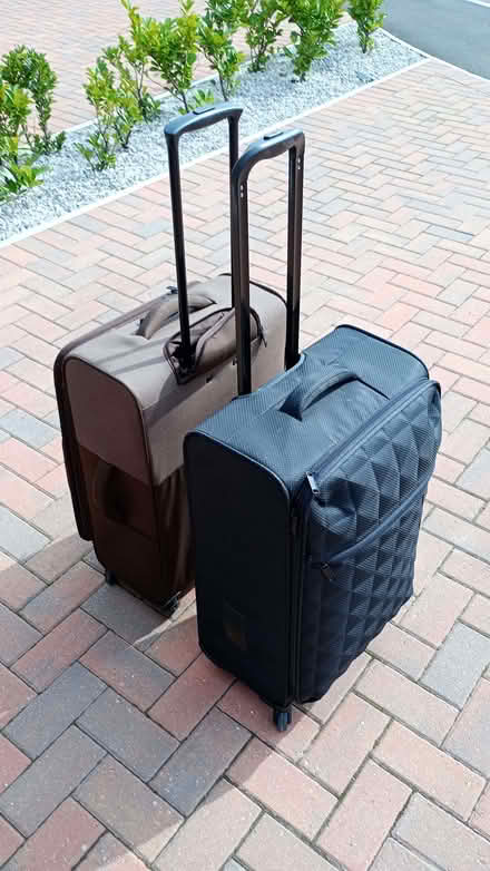 Photo of free Two Medium Suitcases (Common Edge FY4) #2