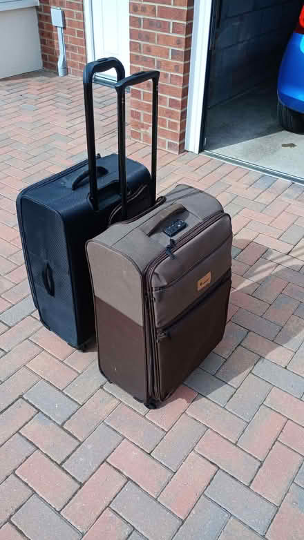 Photo of free Two Medium Suitcases (Common Edge FY4) #1